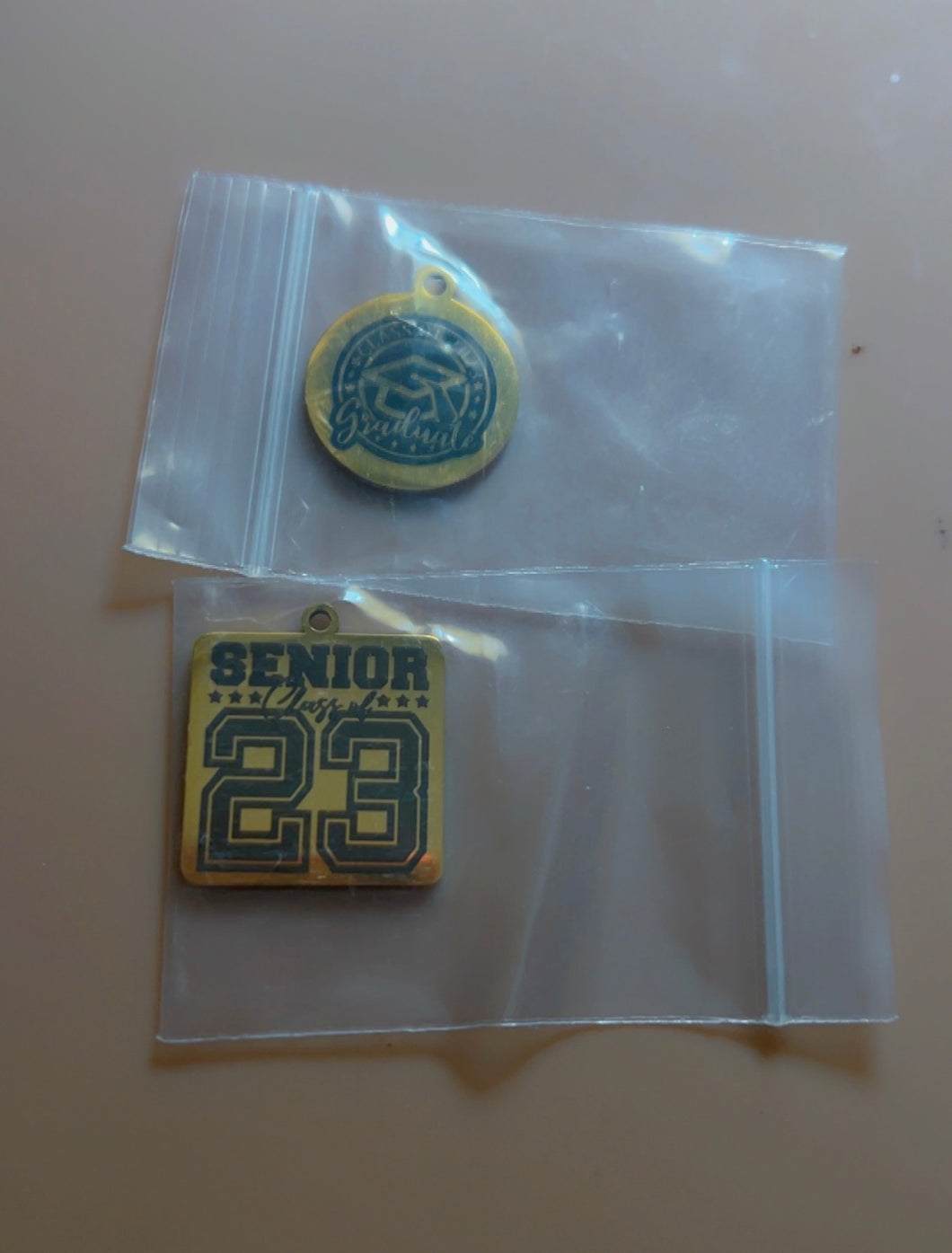 Graduation charms
