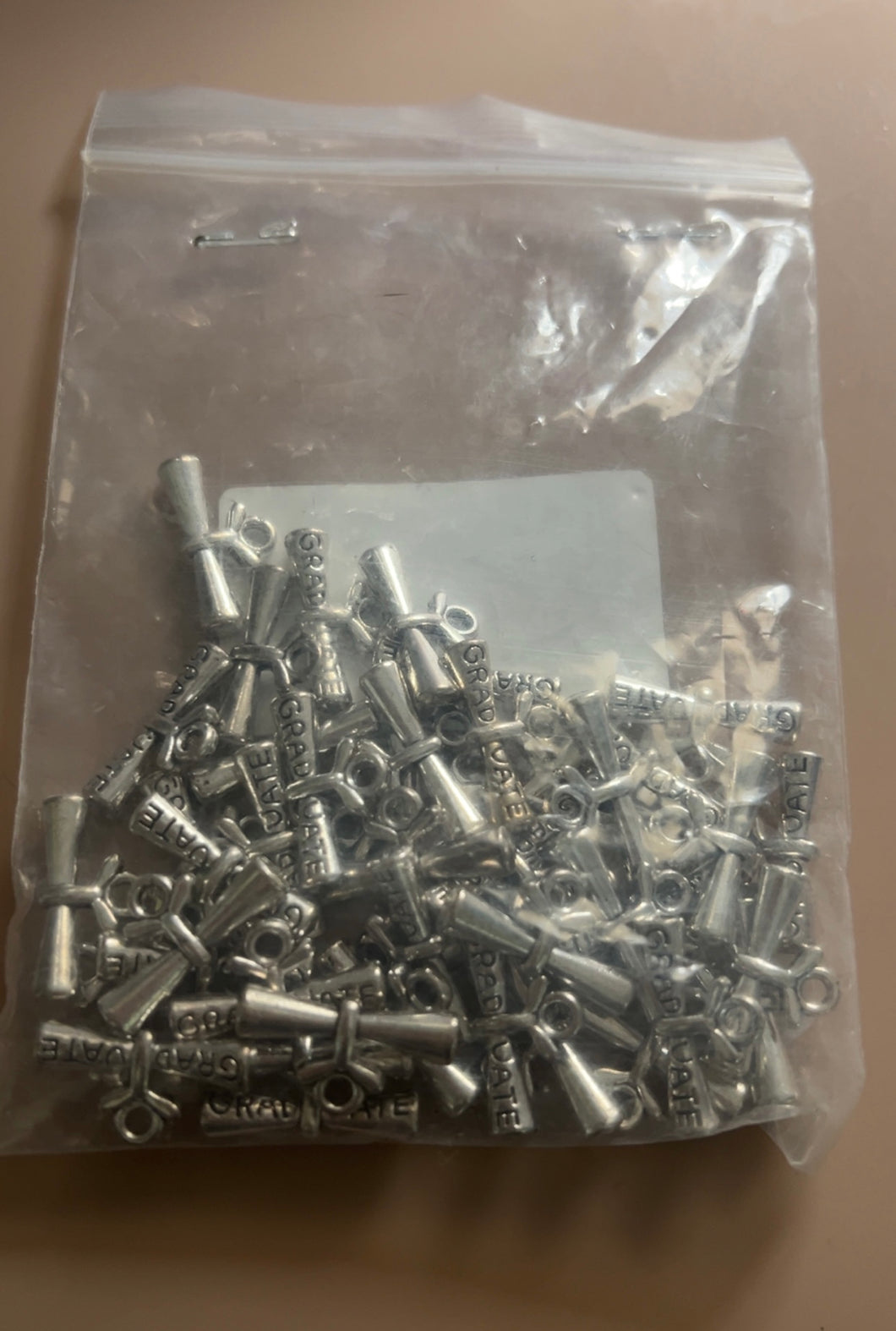Graduate charms